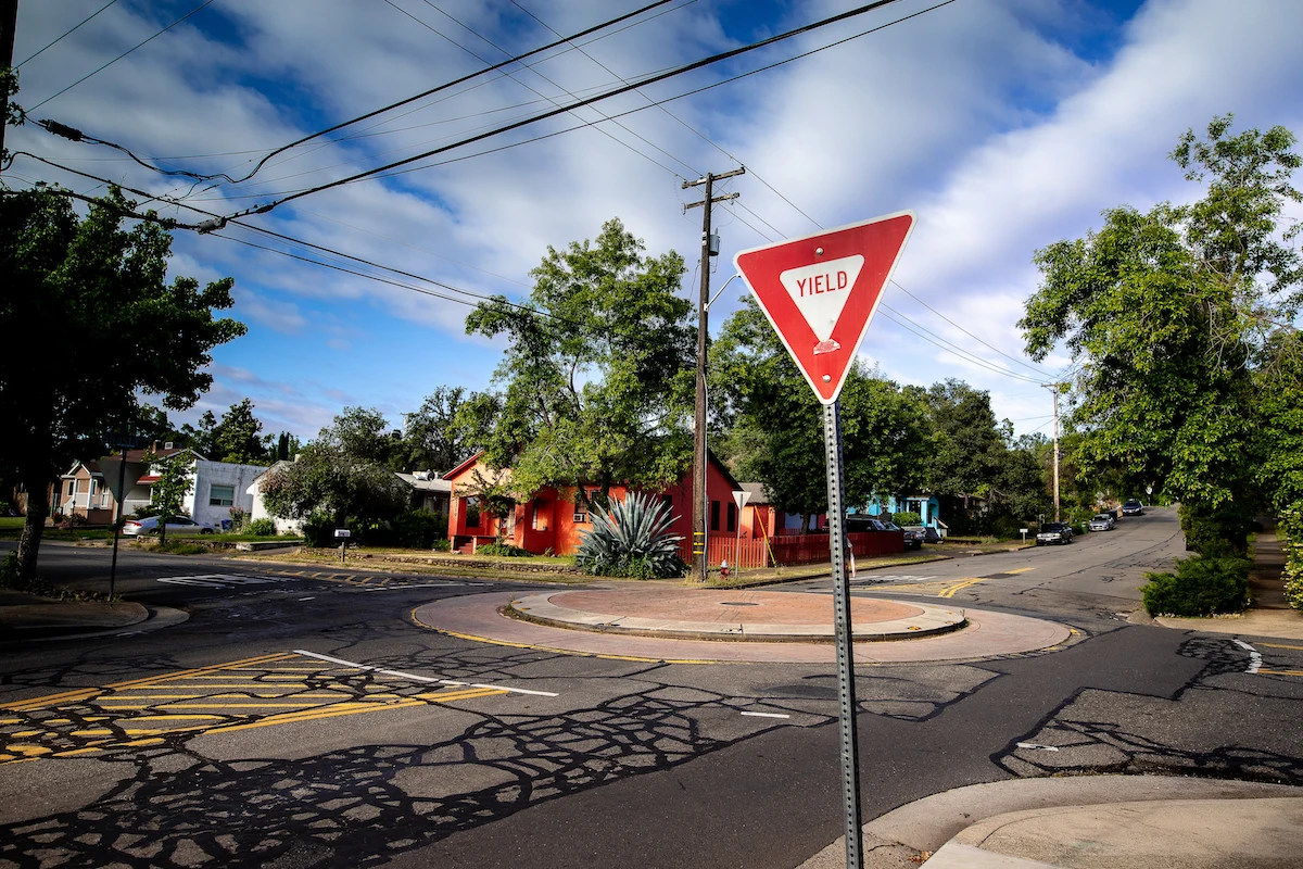 Yield sign at a roundabout-style intersection.